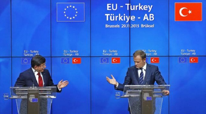 Declaring `new beginning,` EU and Turkey seal migrant deal